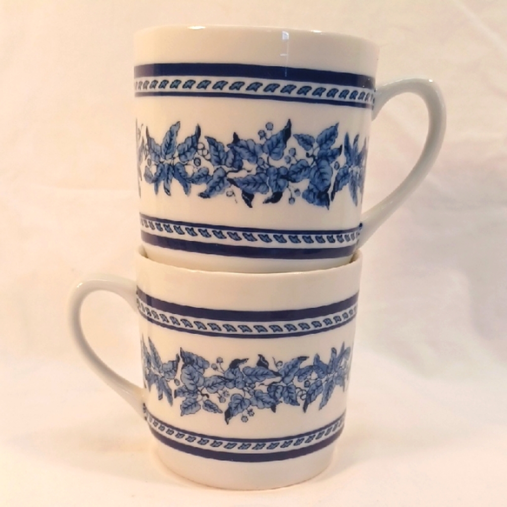 Set of 2 Williams-Sonoma Blue and White Leaf Band Mugs.